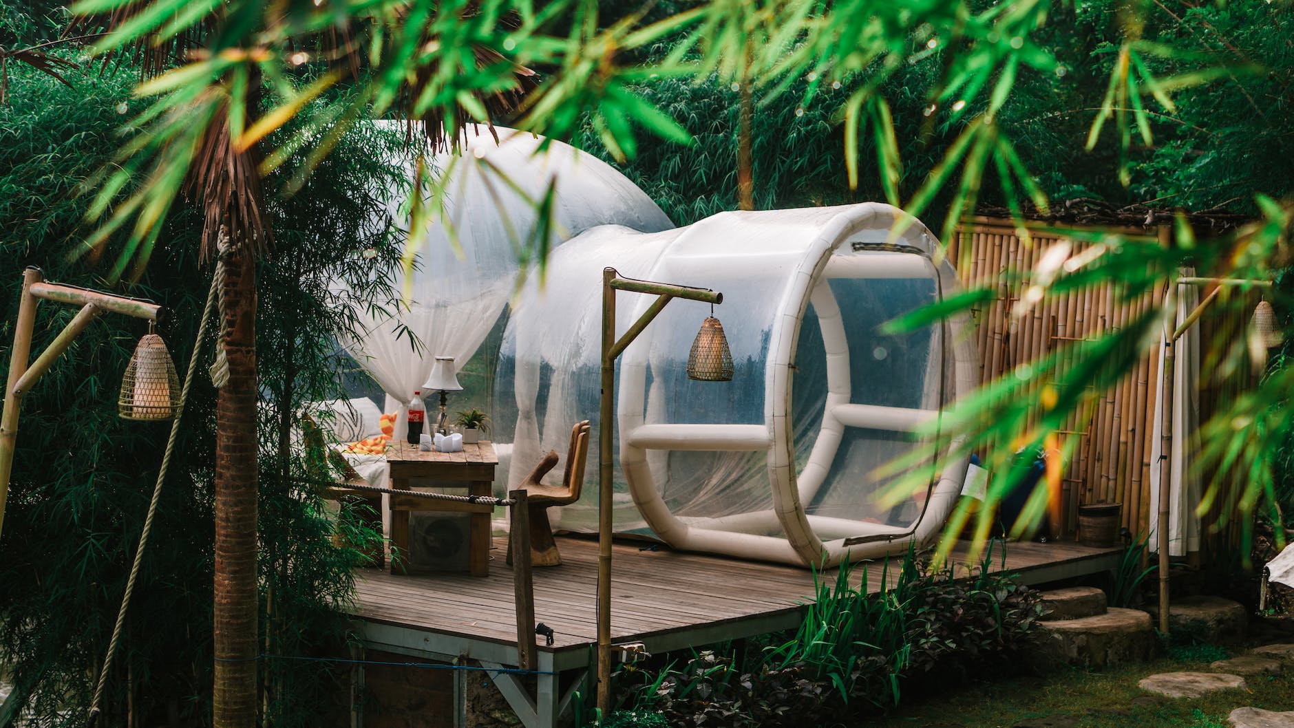 cozy bubble tent in rainforest camp
